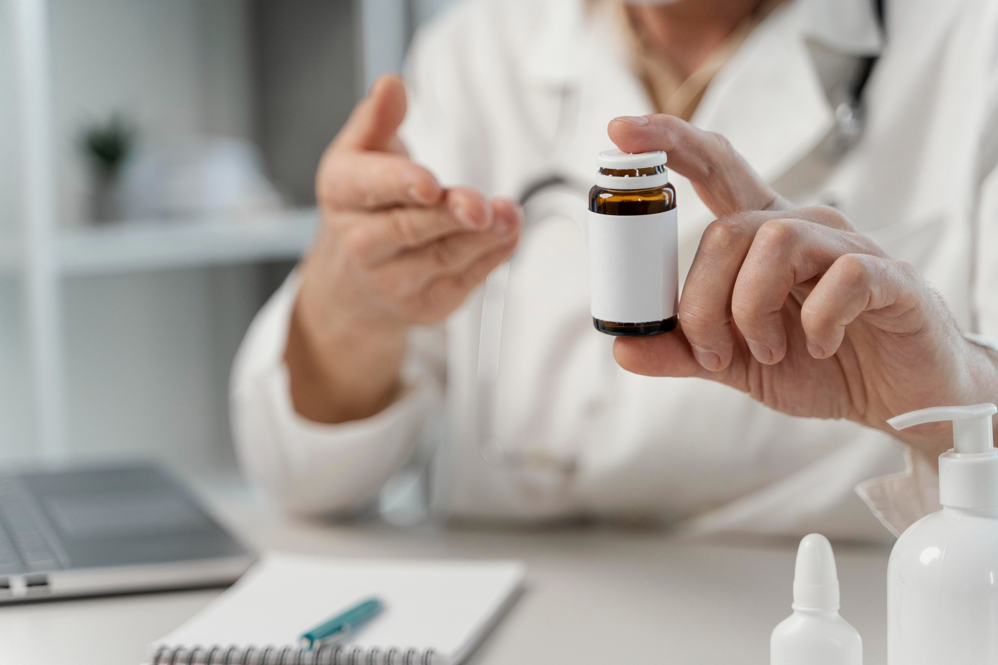 doctor prescribing pills to patient